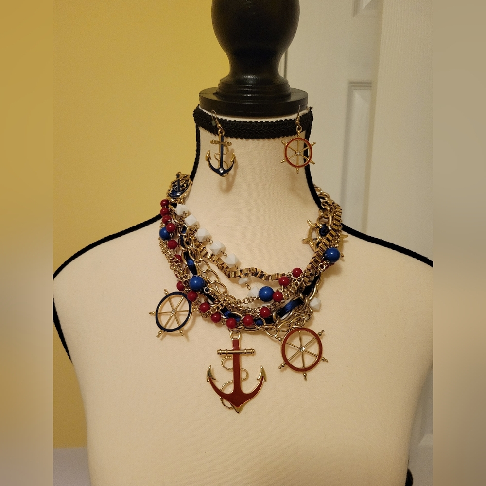 No longer sold anchor nautical gold in color jewlery set! EUC